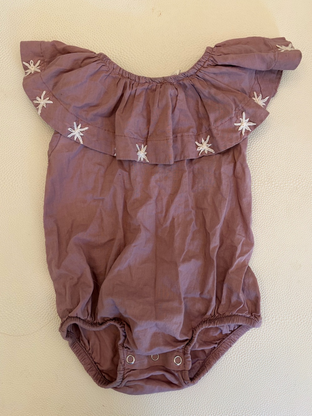 Kate Quinn Mauve Ruffled Baby Romper with White Star Embroidery